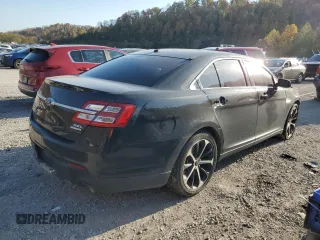 2015 Ford Taurus SEL z VIN 1FAHP2E85FG151155, wystawiony jako Copart lot #77791634 z przebiegiem 224 144 mil mil oraz Szkody całkowita. Historia ofert i sprzedaży dostępna na DreamBid. Obrazek 3.