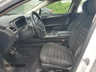 2017 Ford Fusion Hybrid SE с VIN 3FA6P0LU6HR305279, выставлен на аукционе Copart как лот 64864435 с пробегом 134 429 миль миль и Чистый • Clean title. История ставок и продаж доступна на DreamBid. Изображение 7.