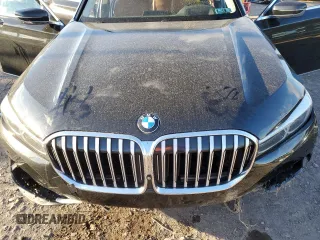 2020 BMW 7 Series 740i xDrive with VIN WBA7T4C04LCD18344, listed as a Copart auction lot 82823384 with Not provided miles and Salvage title. Bid and sale history available at DreamBid. Image 12.