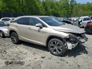 2019 Lexus RX 350 z VIN JTJBZMCA5K2041190, wystawiony jako Copart lot #52142425 z przebiegiem 35 741 mil mil oraz Szkody całkowita. Historia ofert i sprzedaży dostępna na DreamBid. Obrazek 4.