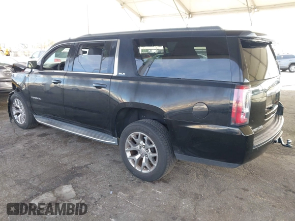2016 GMC Yukon XL SLE with VIN 1GKS1FKC2GR147222, listed as a IAAI auction lot 41390201 with 86,385 mi miles. Bid and sale history available at carsss.com. Image 3.