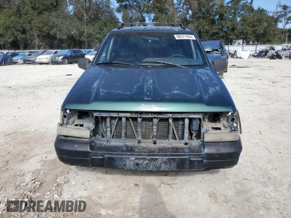 1996 Jeep Grand Cherokee Laredo with VIN 1J4GZ58S1TC340018, listed as a Copart auction lot 86571454 with 0 mi miles and Salvage Title. Bid and sale history available at carsss.com. Image 5.