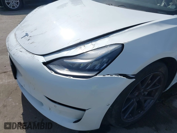 2018 Tesla Model 3 Long Range Battery with VIN 5YJ3E1EB7JF108519, listed as a IAAI auction lot 41835266 with 120,662 mi miles and . Bid and sale history available at DreamBid. Image 21.