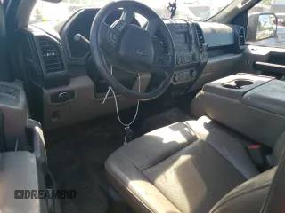 2020 Ford F-150 XL with VIN 1FTMF1C50LKE01683, listed as a Copart auction lot 70235144 with 57,325 mi miles and Salvage Title. Bid and sale history available at carsss.com. Image 8.