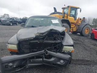 2002 Dodge Dakota with VIN 1B7FL16X62S683972, listed as a IAAI auction lot 41972271 with 158,436 mi miles and . Bid and sale history available at carsss.com. Image 12.