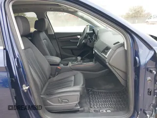 2023 Audi Q5 Premium Plus z VIN WA1BBAFY2P2078231, wystawiony jako IAAI lot #41601204 z przebiegiem 35 007 mil mil oraz . Historia ofert i sprzedaży dostępna na DreamBid. Obrazek 5.