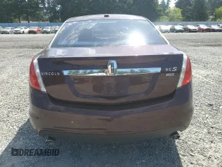 2009 Lincoln MKS z VIN 1LNHM94R89G601127, wystawiony jako Copart lot #60551075 z przebiegiem 102 000 mil mil oraz Szkoda całkowita • Salvage title. Historia ofert i sprzedaży dostępna na DreamBid. Obrazek 6.