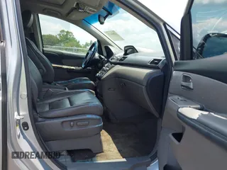 2011 Honda Odyssey Touring with VIN 5FNRL5H99BB058448, listed as a IAAI auction lot 42651432 with 208,581 mi miles and . Bid and sale history available at DreamBid. Image 5.
