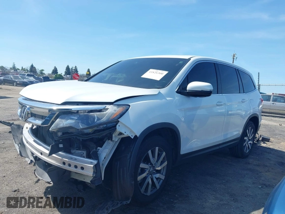 2020 Honda Pilot EX-L with VIN 5FNYF5H59LB027265, listed as a IAAI auction lot 41826300 with 57,201 mi miles. Bid and sale history available at carsss.com. Image 15.