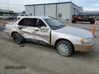 1996 Toyota Camry DX with VIN 4T1BG12K0TU809838, listed as a Copart auction lot 48985365 with 194,822 mi miles and Salvage Title. Bid and sale history available at carsss.com. Image 4.