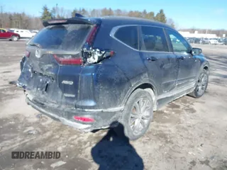 2020 Honda CR-V Touring with VIN 2HKRW2H9XLH605106, listed as a IAAI auction lot 41434008 with Not Provided miles and . Bid and sale history available at carsss.com. Image 4.
