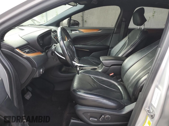2019 Lincoln MKC Reserve with VIN 5LMCJ3D93KUL07493, listed as a Copart auction lot 65519685 with 71,509 mi miles and Salvage title. Bid and sale history available at DreamBid. Image 7.