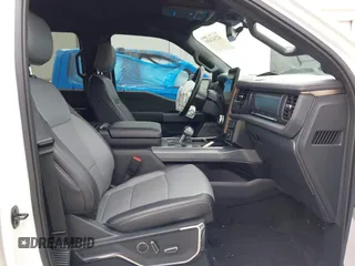 2022 Ford F-150 Lightning Pro with VIN 1FTVW1EL3NWG16132, listed as a IAAI auction lot 42362459 with 16,509 mi miles and . Bid and sale history available at DreamBid. Image 5.