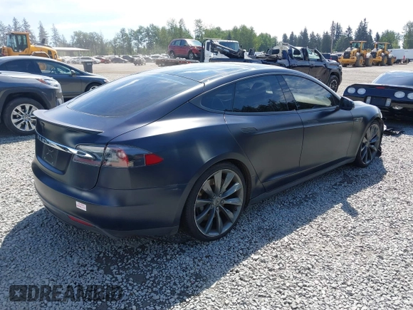 2013 Tesla Model S Performance z VIN 5YJSA1DP2DFP06669, wystawiony jako IAAI lot #42161357 z przebiegiem 177 710 mil mil oraz . Historia ofert i sprzedaży dostępna na DreamBid. Obrazek 4.