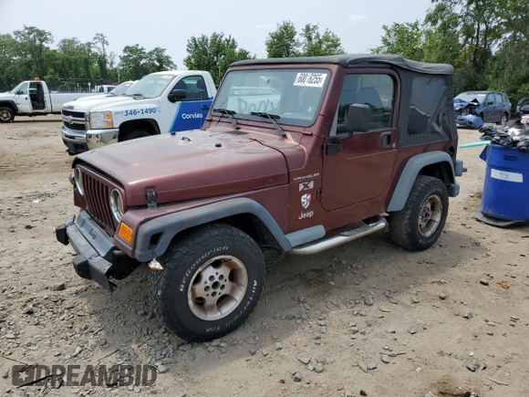 2002 Jeep Wrangler X z VIN 1J4FA39S42P773815, wystawiony jako Copart lot #60016255 z przebiegiem 174 803 mil mil oraz Szkoda całkowita • Salvage title. Historia ofert i sprzedaży dostępna na DreamBid. Obrazek 1.