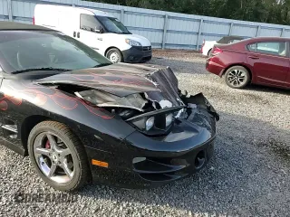 1999 Pontiac Firebird Trans Am with VIN 2G2FV32G1X2217352, listed as a Copart auction lot 79941714 with 174,580 mi miles and Salvage title. Bid and sale history available at DreamBid. Image 11.