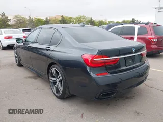2019 BMW 7 Series 750i with VIN WBA7F0C50KGM26010, listed as a IAAI auction lot 42188421 with 71,576 mi miles and . Bid and sale history available at DreamBid. Image 3.