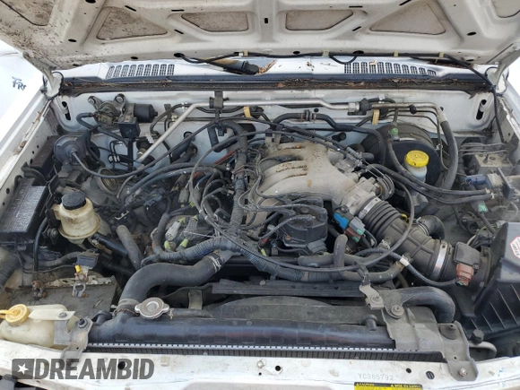 2000 Nissan Frontier XE with VIN 1N6ED27T1YC385792, listed as a Copart auction lot 62268225 with 291,906 mi miles and Salvage title. Bid and sale history available at DreamBid. Image 11.