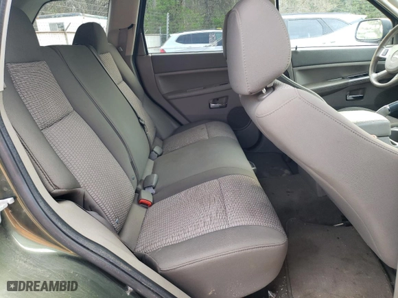 2009 Jeep Grand Cherokee Laredo with VIN 1J8GR48K59C504128, listed as a Copart auction lot 52807835 with 182,053 mi miles and Clean Title. Bid and sale history available at carsss.com. Image 11.