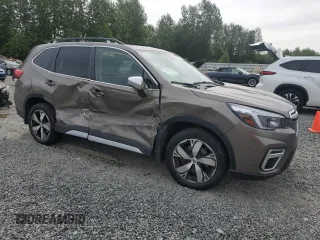 2021 Subaru Forester Touring z VIN JF2SKAXC0MH560263, wystawiony jako Copart lot #61453195 z przebiegiem Nie podano mil oraz Szkoda całkowita • Salvage title. Historia ofert i sprzedaży dostępna na DreamBid. Obrazek 4.