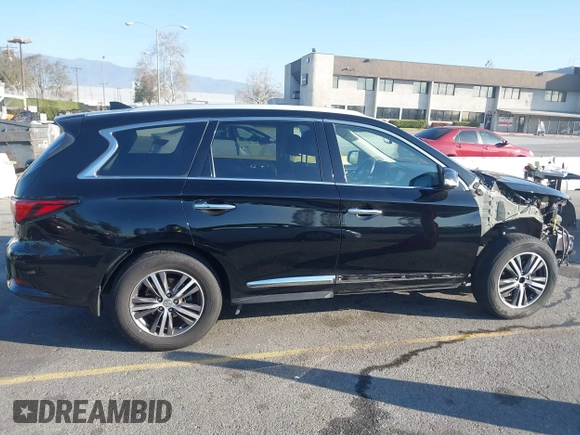 2019 Infiniti QX60 Luxe with VIN 5N1DL0MN0KC502373, listed as a IAAI auction lot 41646327 with 69,250 mi miles and . Bid and sale history available at DreamBid. Image 14.