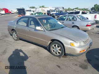 1994 Honda Accord EX z VIN JHMCD5655RC120856, wystawiony jako IAAI lot #42477329 z przebiegiem 258 197 mil mil oraz . Historia ofert i sprzedaży dostępna na DreamBid. Obrazek 1.