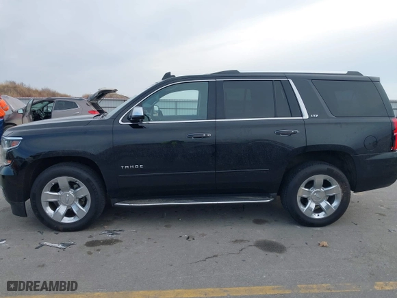 2016 Chevrolet Tahoe LTZ with VIN 1GNSKCKC9GR217166, listed as a IAAI auction lot 41152096 with 133,589 mi miles. Bid and sale history available at carsss.com. Image 14.