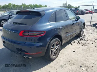 2015 Porsche Macan S with VIN WP1AB2A55FLB67075, listed as a IAAI auction lot 42068637 with 148,068 mi miles. Bid and sale history available at carsss.com. Image 4.