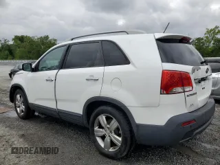 2012 Kia Sorento EX z VIN 5XYKU4A20CG301970, wystawiony jako Copart lot #54360795 z przebiegiem 208 616 mil mil oraz Szkoda całkowita • Salvage title. Historia ofert i sprzedaży dostępna na DreamBid. Obrazek 2.