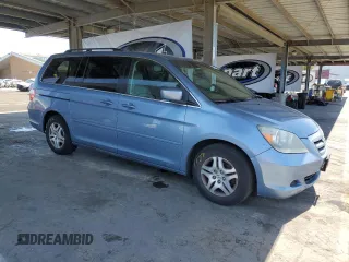 2007 Honda Odyssey EX-L z VIN 5FNRL38647B077250, wystawiony jako Copart lot #56925425 z przebiegiem 159 281 mil mil oraz Szkoda całkowita • Salvage title. Historia ofert i sprzedaży dostępna na DreamBid. Obrazek 4.