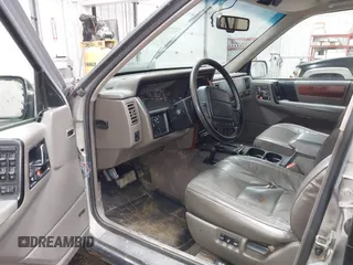 1994 Jeep Grand Cherokee Limited with VIN 1J4GZ78Y8RC165923, listed as a IAAI auction lot 42275894 with 247,977 mi miles and . Bid and sale history available at DreamBid. Image 5.