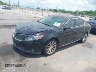 2014 Lincoln MKS with VIN 1LNHL9DK0EG605429, listed as a IAAI auction lot 42809745 with 127,038 mi miles and . Bid and sale history available at DreamBid. Image 14.