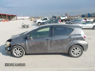 2013 Toyota Prius One with VIN JTDKDTB32D1553545, listed as a IAAI auction lot 41697614 with 157,945 mi miles and . Bid and sale history available at carsss.com. Image 14.