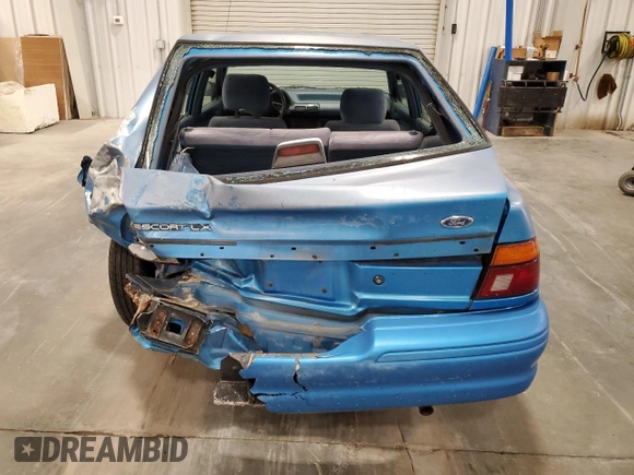 1994 Ford Escort z VIN 1FARP14J9RW318226, wystawiony jako Copart lot #60507135 z przebiegiem 69 041 mil mil oraz Szkoda całkowita • Salvage title. Historia ofert i sprzedaży dostępna na DreamBid. Obrazek 6.