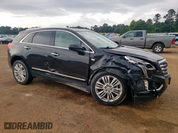 2017 Cadillac XT5 Premium Luxury AWD with VIN 1GYKNERS3HZ214851, listed as a Copart auction lot 60112185 with 74,045 mi miles and Salvage title. Bid and sale history available at DreamBid. Image 4.