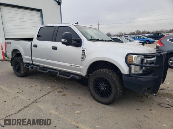 2019 Ford F-250 XL with VIN 1FT7W2BT0KEC17148, listed as a Copart auction lot 84203284 with 101,037 mi miles and Salvage title. Bid and sale history available at DreamBid. Image 4.