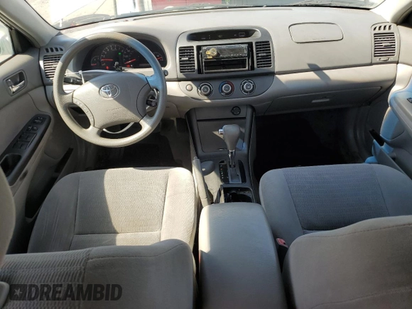 2005 Toyota Camry STD z VIN 4T1BE32K55U410458, wystawiony jako Copart lot #61082745 z przebiegiem 242 261 mil mil oraz Szkoda całkowita • Salvage title. Historia ofert i sprzedaży dostępna na DreamBid. Obrazek 8.