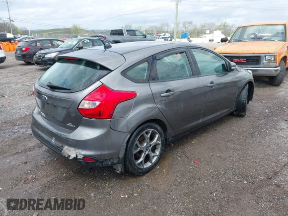 2014 Ford Focus SE with VIN 1FADP3K28EL337377, listed as a IAAI auction lot 41962856 with 137,906 mi miles. Bid and sale history available at carsss.com. Image 4.