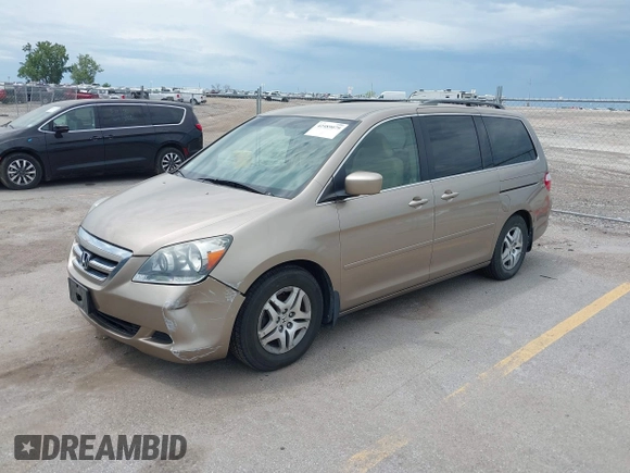 2005 Honda Odyssey EX with VIN 5FNRL38475B029026, listed as a IAAI auction lot 42489079 with 156,075 mi miles and . Bid and sale history available at DreamBid. Image 2.