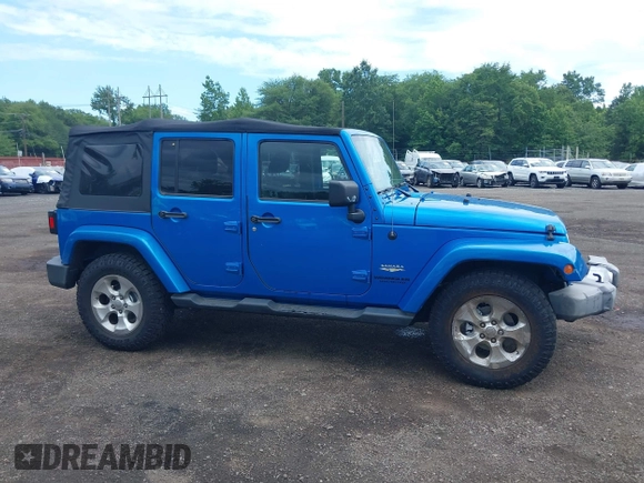 2015 Jeep Wrangler Unlimited Sahara with VIN 1C4BJWEG4FL677879, listed as a IAAI auction lot 42676097 with 85,821 mi miles and . Bid and sale history available at DreamBid. Image 13.