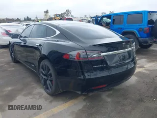 2018 Tesla Model S 75D with VIN 5YJSA1E42JF265691, listed as a IAAI auction lot 41886105 with 99,485 mi miles and . Bid and sale history available at DreamBid. Image 3.