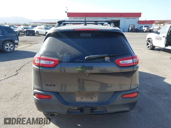 2014 Jeep Cherokee Latitude with VIN 1C4PJMCBXEW317384, listed as a IAAI auction lot 41621635 with 180,971 mi miles and . Bid and sale history available at DreamBid. Image 17.