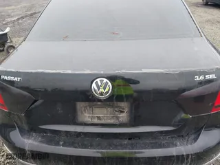 2013 Volkswagen Passat SEL Premium with VIN 1VWCM7A3XDC132834, listed as a IAAI auction lot 40931506 with 146,283 mi miles. Bid and sale history available at carsss.com. Image 6.