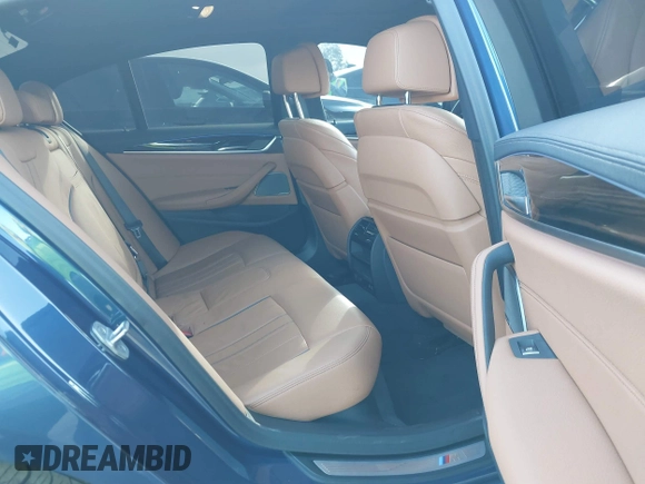 2021 BMW 5 Series M550i xDrive z VIN WBA13BK0XMCG75802, wystawiony jako IAAI lot #41503977 z przebiegiem 20 741 mil mil oraz . Historia ofert i sprzedaży dostępna na DreamBid. Obrazek 8.