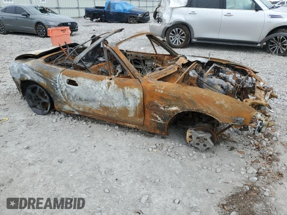 2003 Mazda MX-5 Miata Cloth with VIN JM1NB353730312678, listed as a Copart auction lot 43416365 with Not Provided miles and Non Repairable. Bid and sale history available at DreamBid. Image 4.