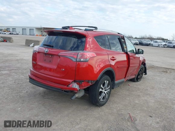 2016 Toyota RAV4 LE with VIN JTMZFREV0GJ063201, listed as a IAAI auction lot 41160385 with 190,190 mi miles. Bid and sale history available at carsss.com. Image 4.