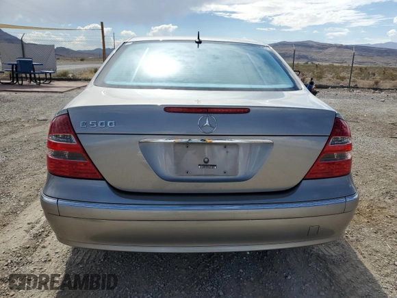 2004 Mercedes-Benz E-Class 5.0L with VIN WDBUF70J54A496963, listed as a Copart auction lot 64214634 with 113,575 mi miles and Salvage Title. Bid and sale history available at carsss.com. Image 6.