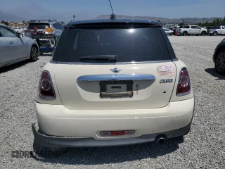 2013 MINI Hardtop z VIN WMWSU3C50DT685902, wystawiony jako Copart lot #58071935 z przebiegiem 114 908 mil mil oraz Szkoda całkowita • Salvage title. Historia ofert i sprzedaży dostępna na DreamBid. Obrazek 6.