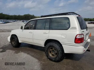 2001 Lexus LX 470 with VIN JTJHT00W913507524, listed as a Copart auction lot 51601785 with 171,779 mi miles and Salvage Title. Bid and sale history available at carsss.com. Image 2.