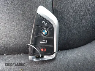 2019 BMW 3 Series 330i xDrive with VIN WBA5R7C53KAJ84615, listed as a IAAI auction lot 41774006 with Not provided miles and . Bid and sale history available at DreamBid. Image 11.
